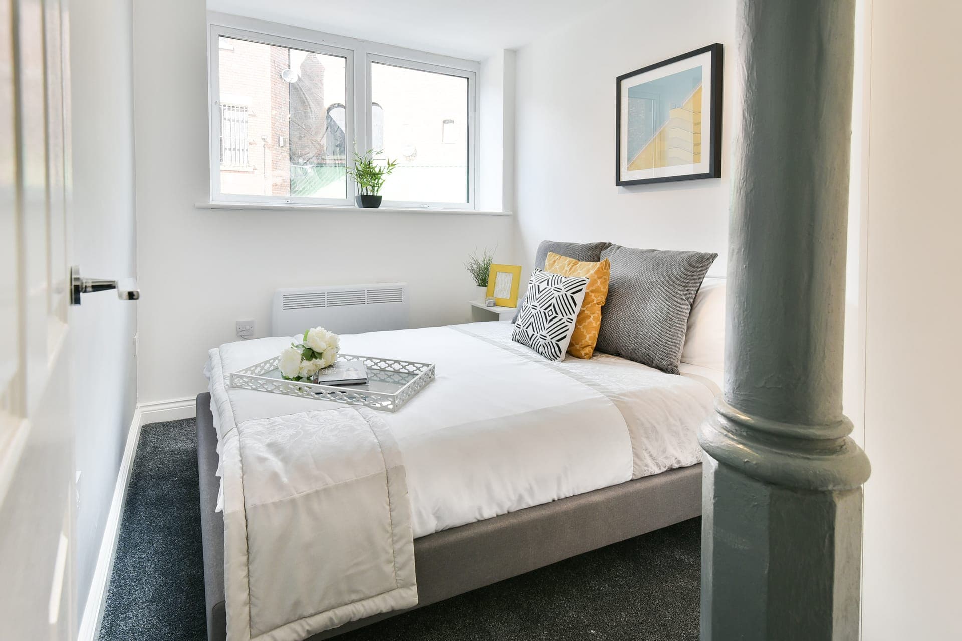 Bedroom with the original cast-iron column