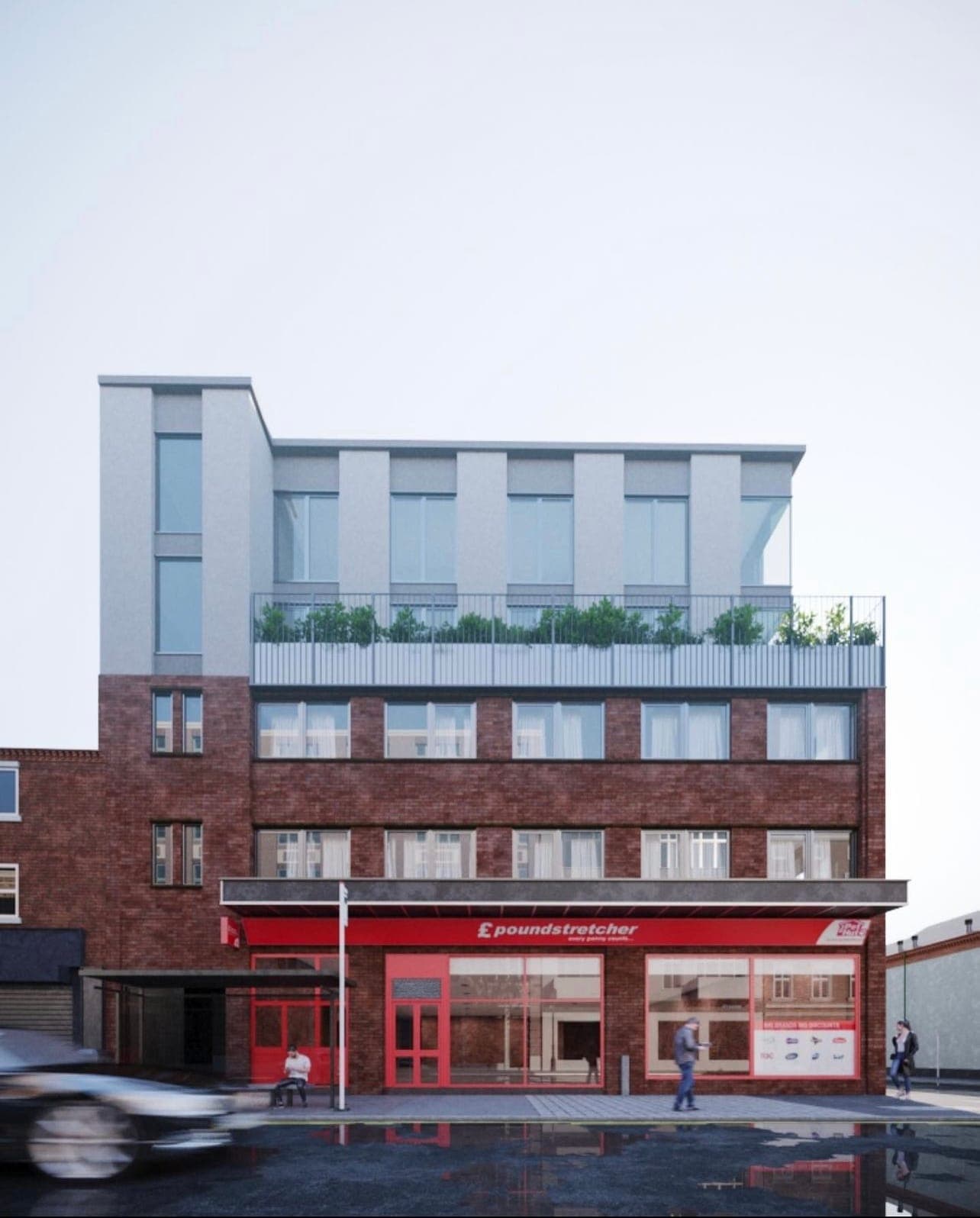 The full front elevation with its rooftop storey and terrace planting