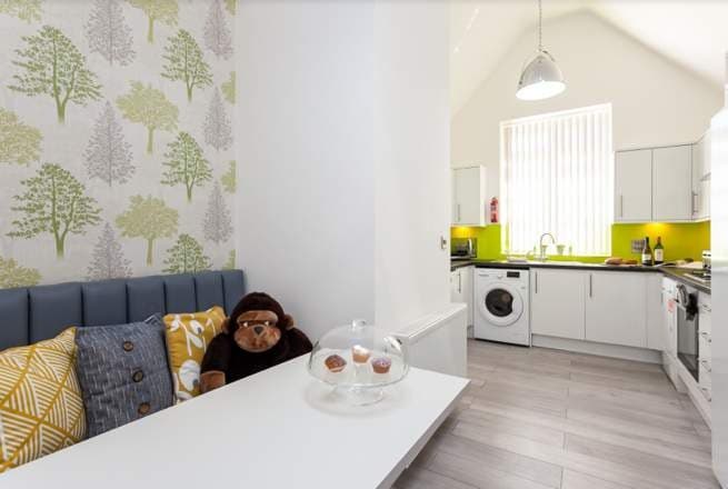 Fitted kitchen and dining area