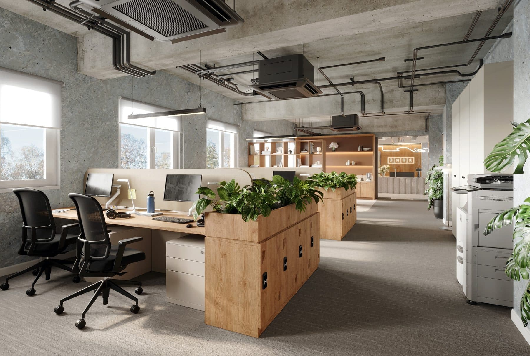 Open-plan desks with planted storage beneath an exposed concrete soffit