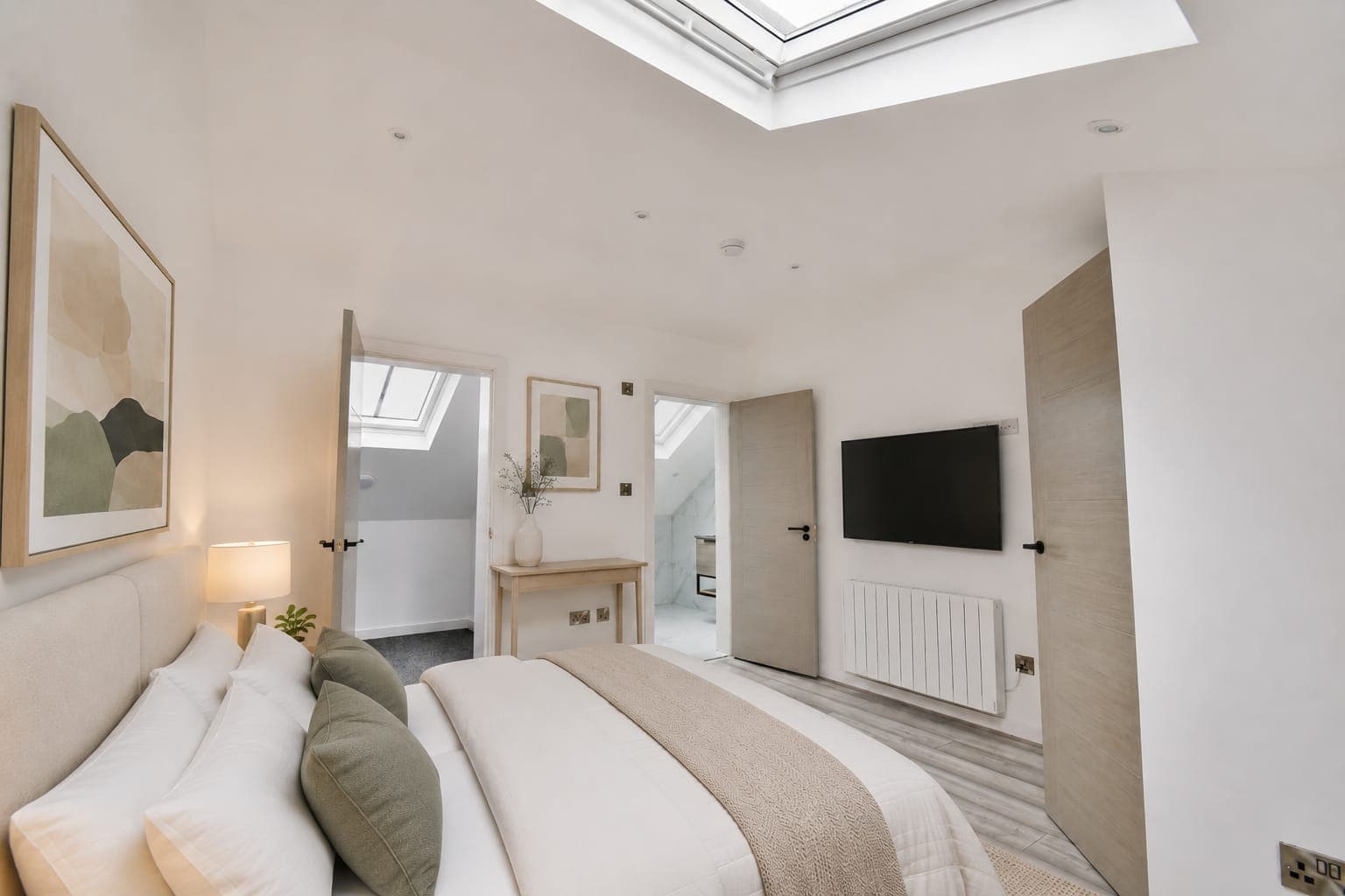 Duplex bedroom with the landing beyond