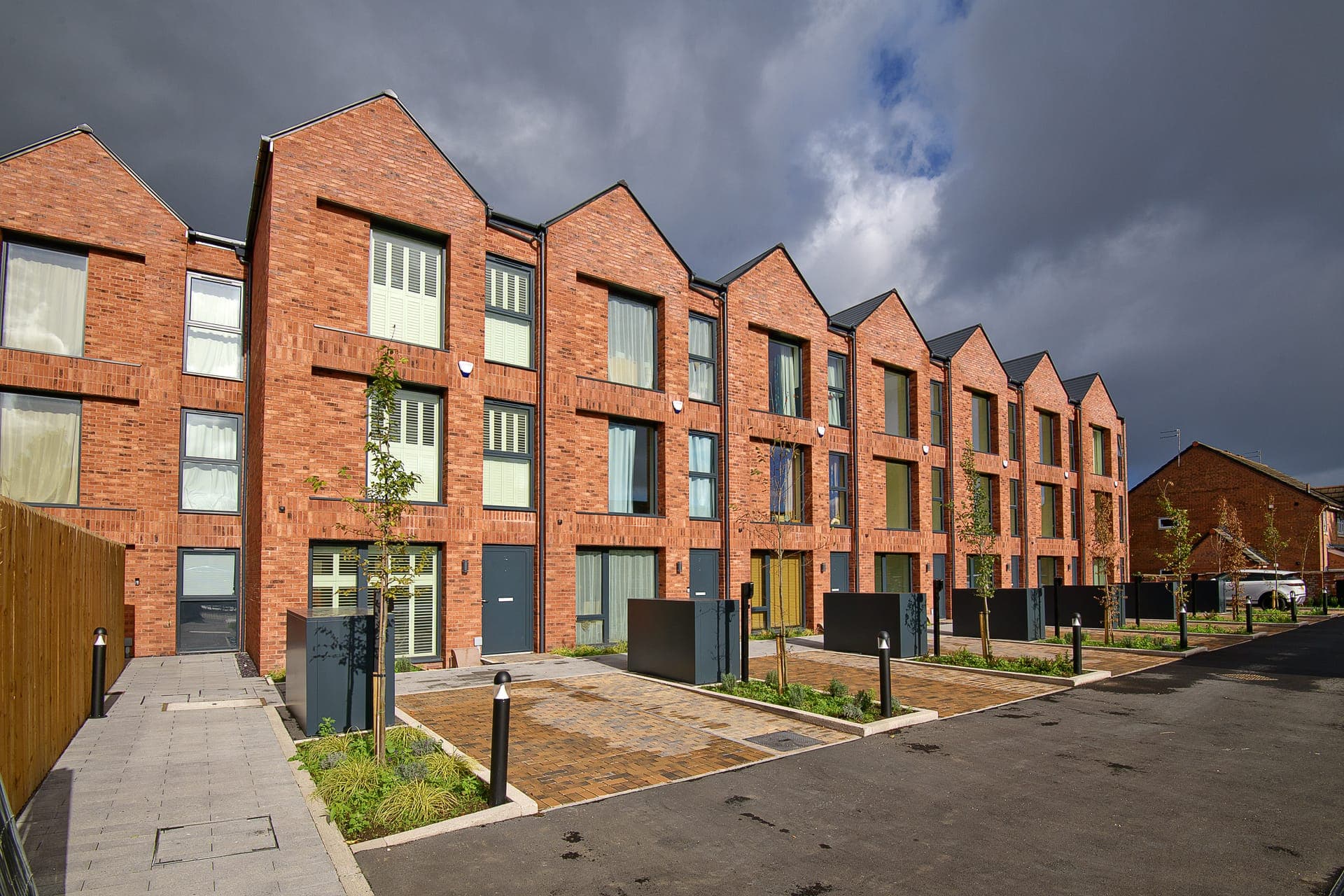 The terrace of eight townhouses with its gabled roofline
