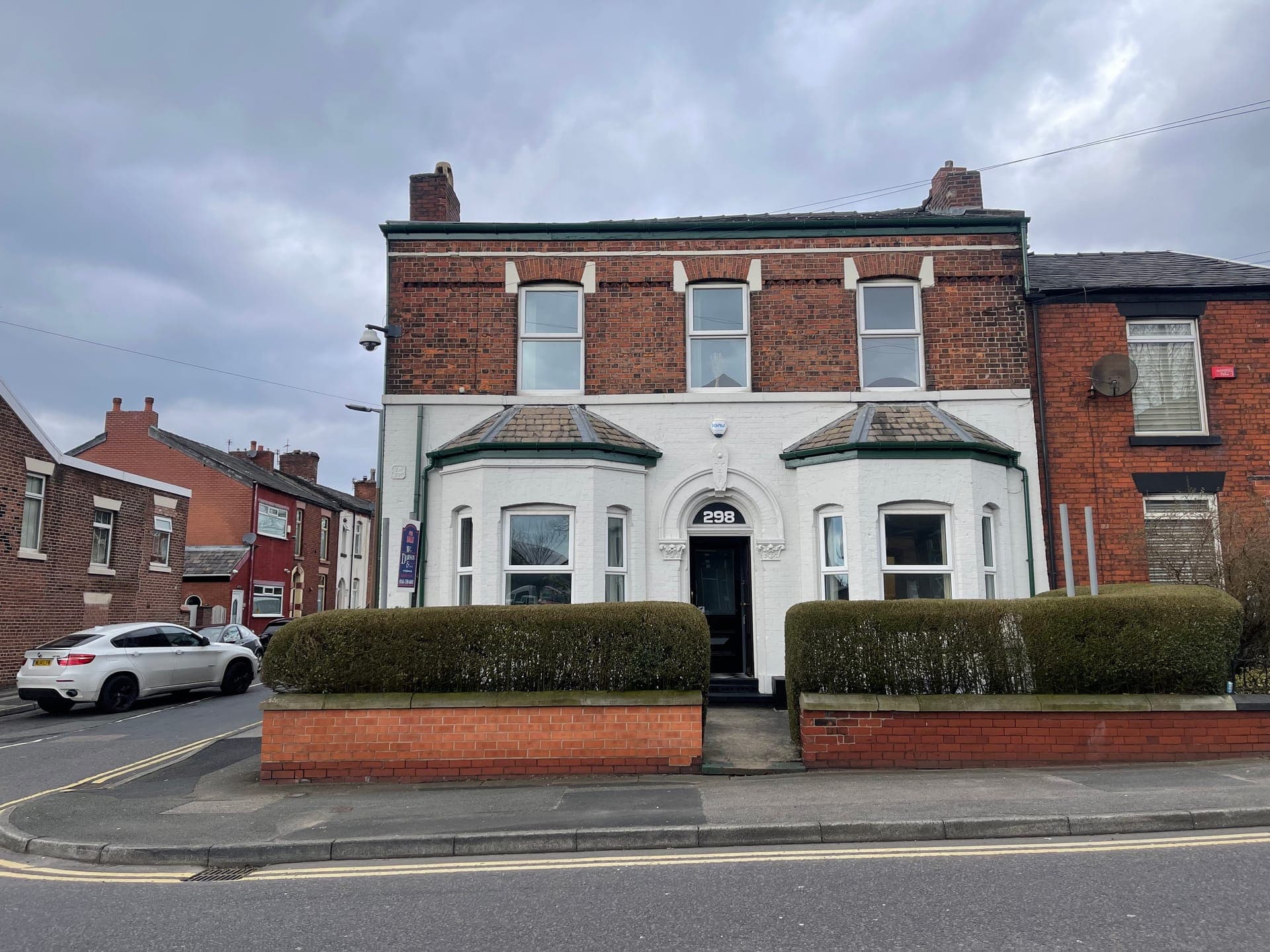 The building in its terraced street