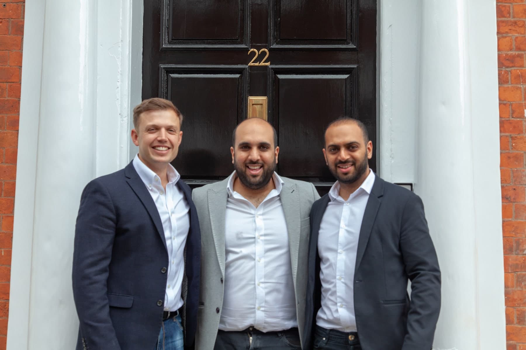 Satis Group founders Tom Morley, Shiro Rauniar and Shaunak Rauniar outside 22 St John Street