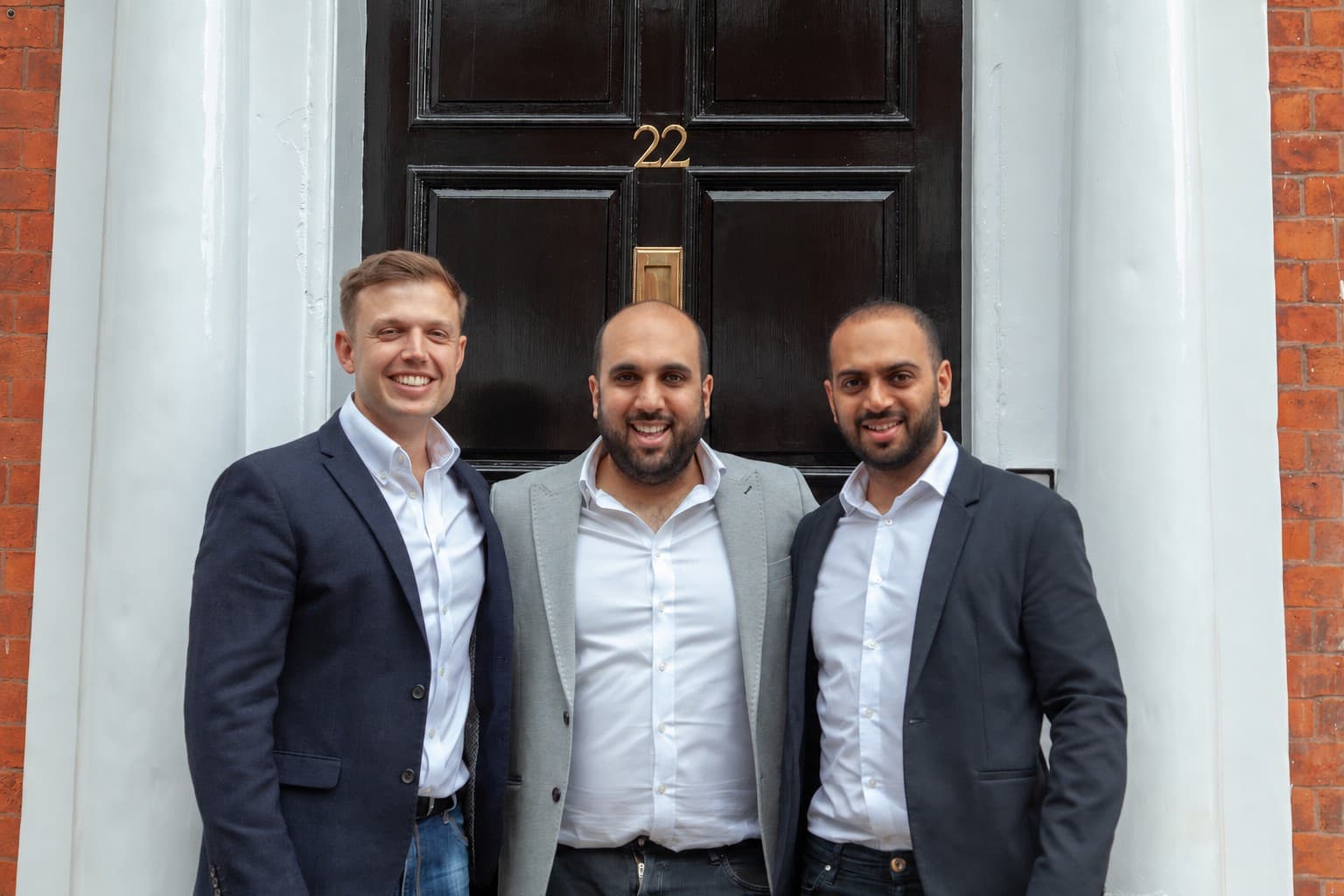 SATIS Group founders Tom Morley, Shiro Rauniar and Shaun Rauniar outside 22 St John Street